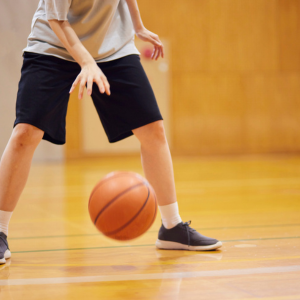 youth dribbling basketball youth dribbling a basketball